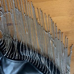 Black leather shorts with diamond fringe